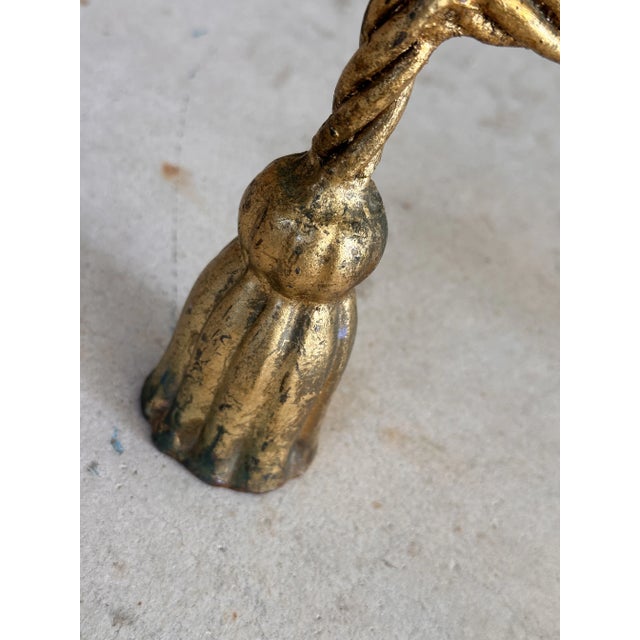 This exquisite vintage Italian side table features a sculptural gilt iron base designed to mimic twisted rope, complete...