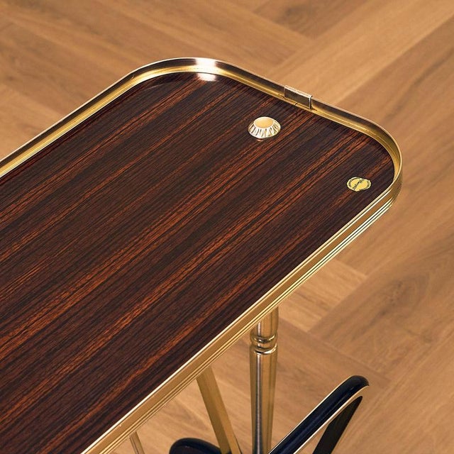 Serving trolley was manufactured in Denmark, in the 1950s-60s with a sticker by AJ Hagensen, Nørresundby. It is made of...