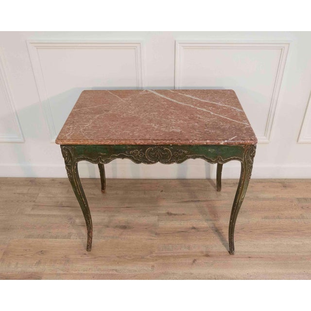 This elegant Regency period game table features a finely painted wooden base in a rich, time-softened green patina,...
