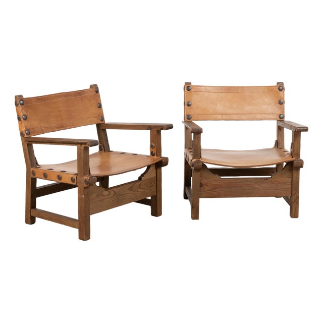 Pair of Mid-Century Spanish Brutalist Cognac Leather Arm Chairs For Sale