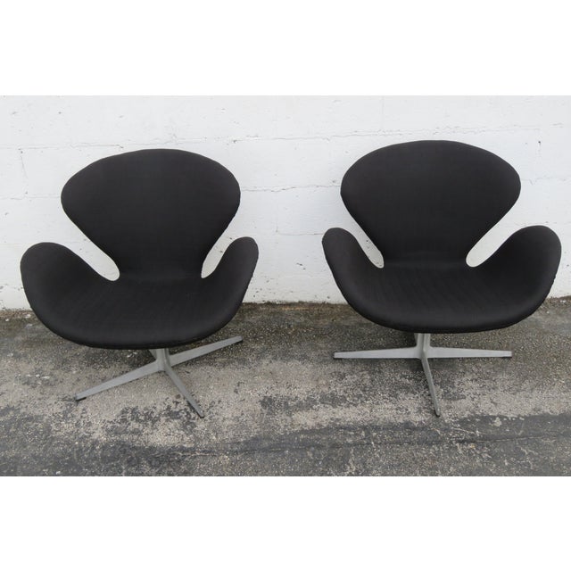 This Pair of Side Chairs are made out of metal, aluminum, upholstery. These chairs have Danish Modern style, swan design,...