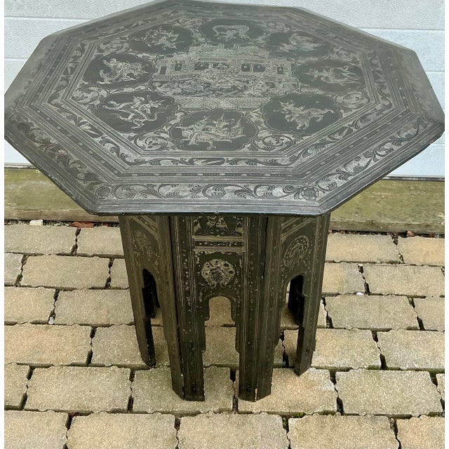 Beautiful late 19th-early 20th century Burmese black laquer octagonal table hand etched in white with people and...