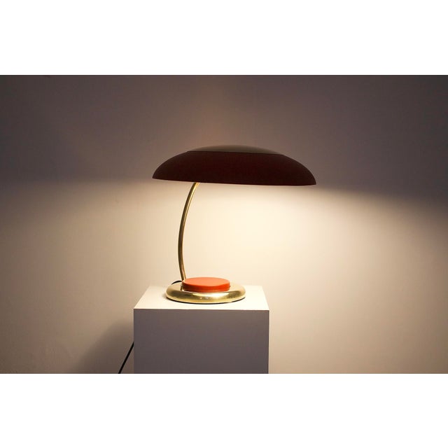1960s: Modernist brass desk lamp with a large red push button. H 38 cm × reflector diameter 38 cm. Base diameter: 17 cm....