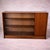 Mid-Century Teak Sliding Door Bookcase with Glass Front by Herbert Gibbs, 1970s, in Very Good conditions. Designed 1970 to...