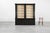 This elegant tall library cabinet from the United Kingdom, crafted in the 20th century, combines classic architectural...