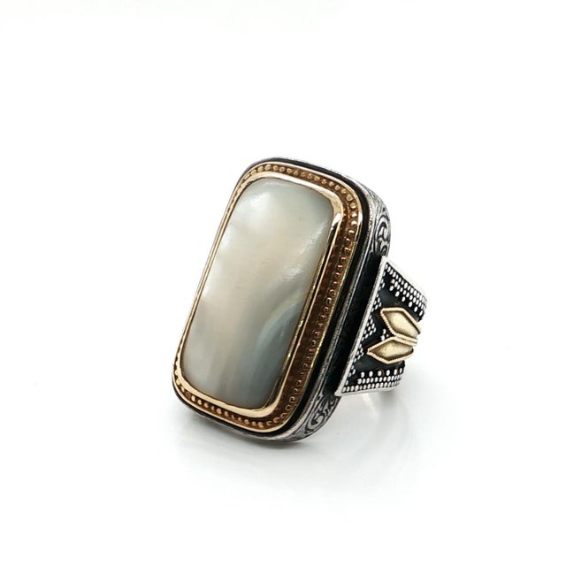 This bold and authentic Konstantino ring is a true statement piece, showcasing the brands renowned craftsmanship and...