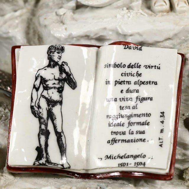 Germano Cortese designed "Michelangelo Sculpts David", 20th century, Early Limited Edition. Capodimonte porcelain on wood...