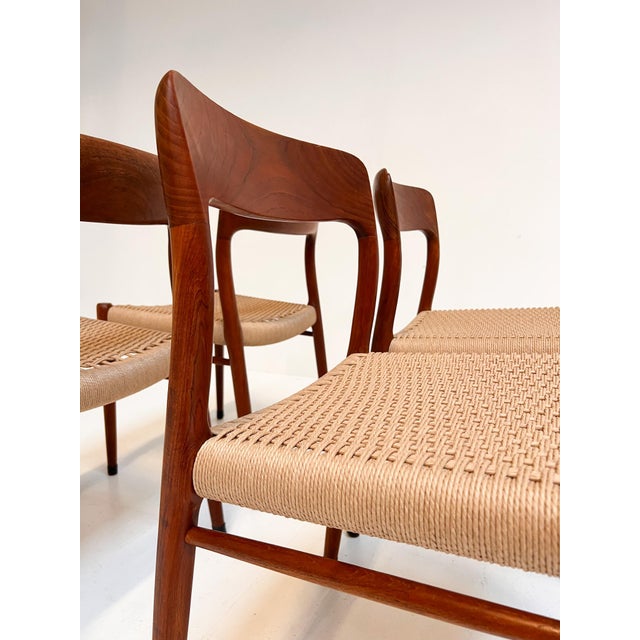 A design classic, this set (4) of model 75 chairs by Niels Otto Møller! Crafted from warm teak and recently fitted with...