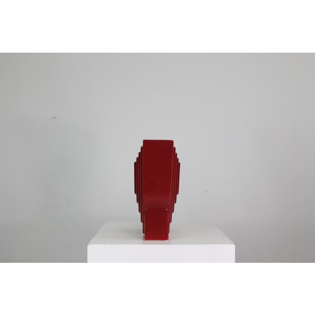 This ceramic piece is part of the Yantra series by Ettore Sottsass, a collection of thirty-nine forms including...