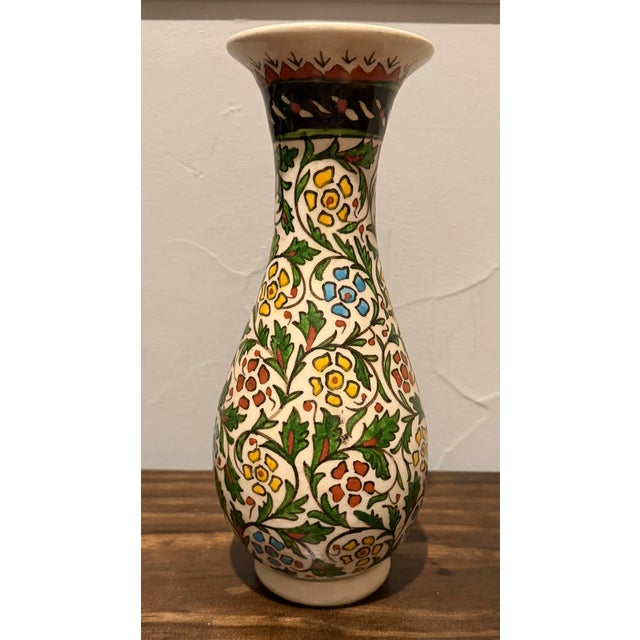 A wonderfully decorative vintage Turkish ceramic vase featuring dense, hand-painted floral and foliate ornament inspired...