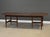 A mid century modern solid Cherry oval dining table made by Willett Furniture with two 14.125” leaves which fully extend...