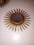 Pair of sunburst mirrors from the 1960s, possibly made in France