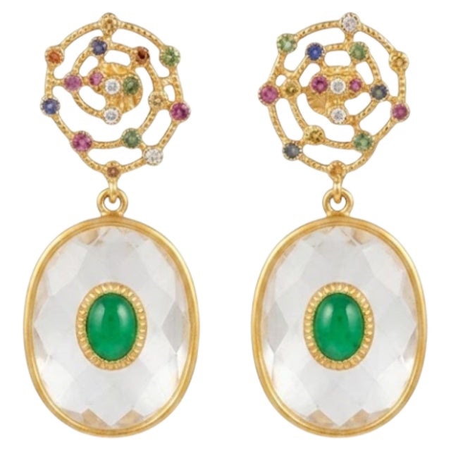 Gemstone details Multi sapphire weight: 0.50cts Emerald weight: 0.74 cts White topaz weight: 13.85 cts 14K gold Gross...