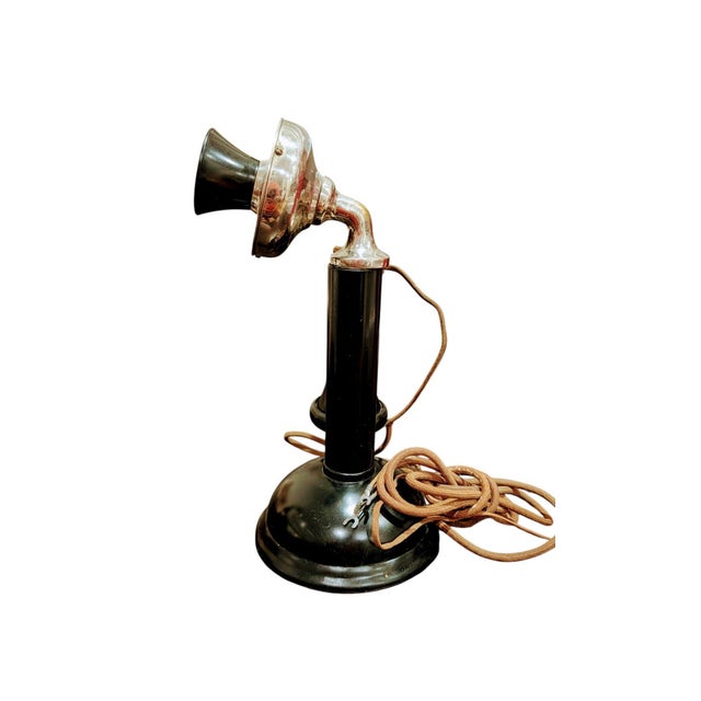 This is an antique non-dial candlestick telephone, also known as a desk stand or upright telephone. This classic style was...