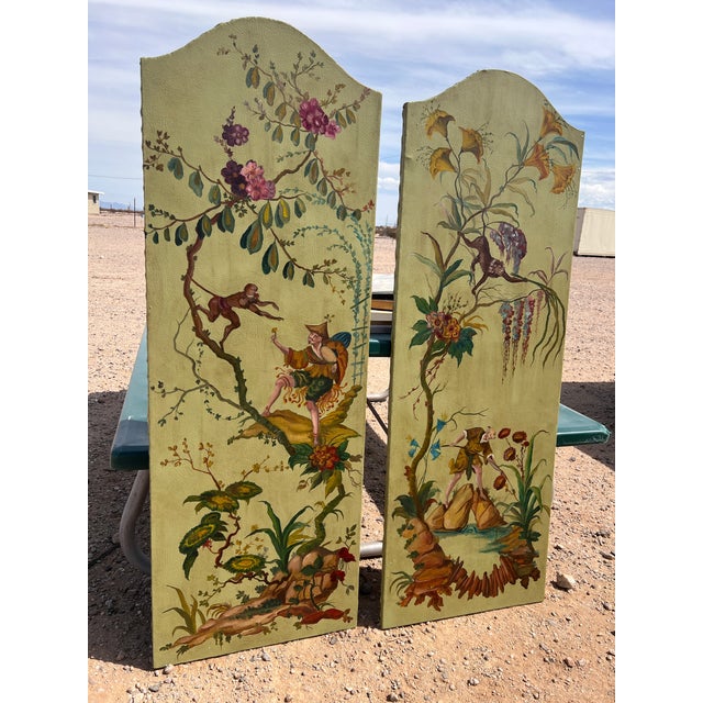 An exceptional pair of oil on leather continental Chinoiserie style painting panels. Each panel is 69 in tall, with...