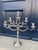 matched pair of five-light candelabra with tilted brass