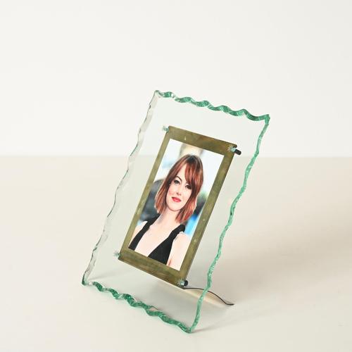 Marvelous and incredibly rare photo frame in chiseled Nile green crystal and solid brass, designed by Pietro Chiesa and...