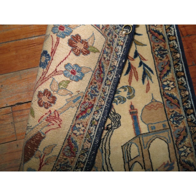 One of a kind mid-20th century high decorative caliber Pictorial Persian Nain rug with a woman playfully playing with her...