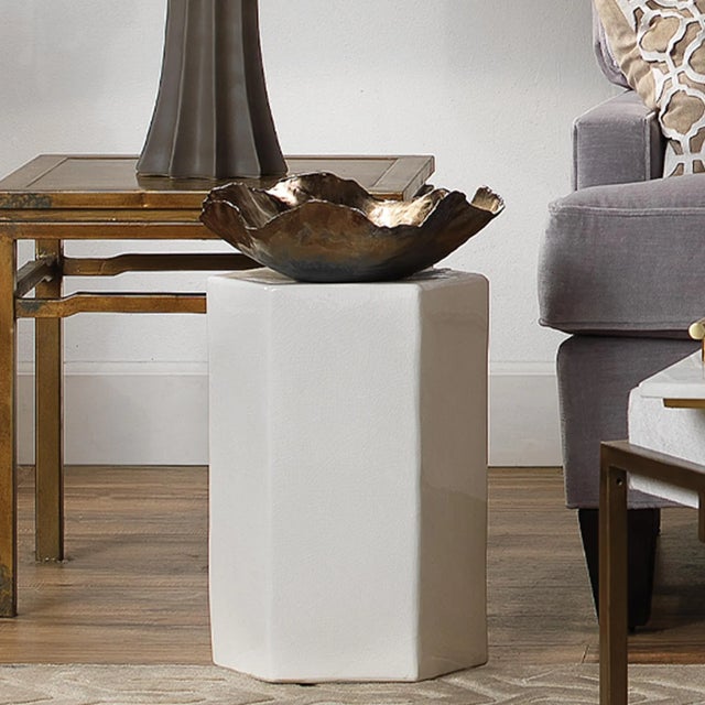 This delicate catchall bowl has graceful organic edges that are perfectly imperfect, like the flower petals they were...