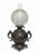 Offered is a stunning, late 19th-century antique patinated bronze kerosene table lamp in its highly desirable, original...