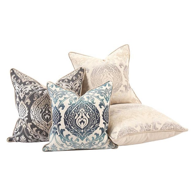 Various shades of blue chenille threads transition throughout this traditional damask pattern by Robert Allen Fabrics. The...