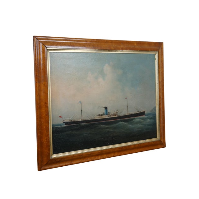 Antique nautical maritime oil painting on canvas depictting a British steam ship on a choppy sea. Beveled birdseye maple...
