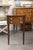 This is one of a pair of elegant identical English George III-style mahogany side table featuring a clean, refined...