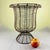 From France, A very large pedestal base, urn form twisted wire standing basket with a wide upper rolled rim, circa...