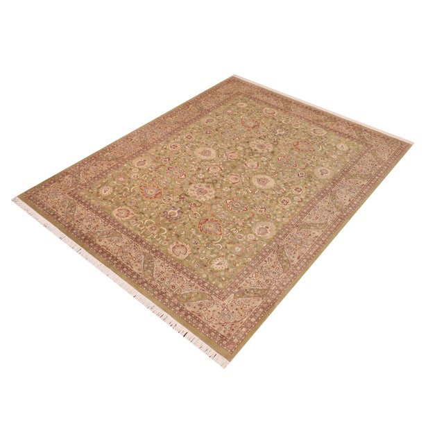 Designed with mesmerizing intricacy and gorgeous color palette, this hand-knotted masterpiece demonstrates the beauty and...