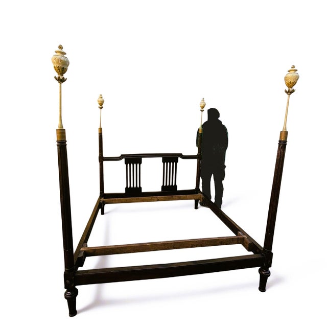 Large walnut bed, featuring an openwork headboard and four posts ending in lacquered and gilded wooden vases. Bed for a...