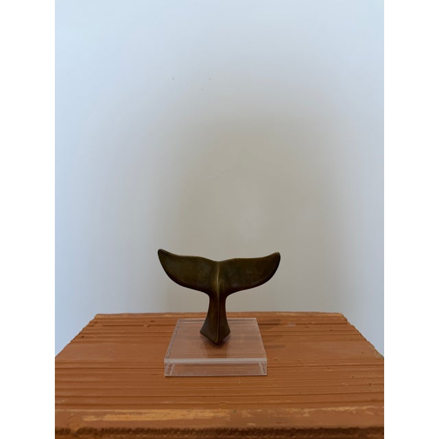 Brazilian modernist bronze sculpture of a whale fluke on an acrylic base by unknown artist. The bronze sculpture is not...