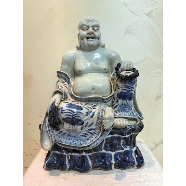 W-22cm,H-31.5cm This hand-carved blue and white porcelain statue depicts The Eighteen Arhats, a traditional Chinese...