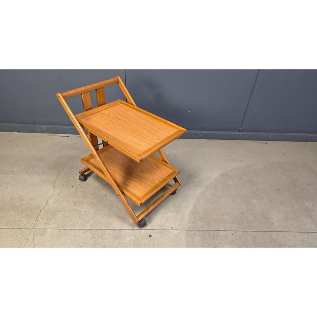 Very handy foldable italian bar cart made from wood. Attractive and timeless piece. Very good condition 1980s - Italy...