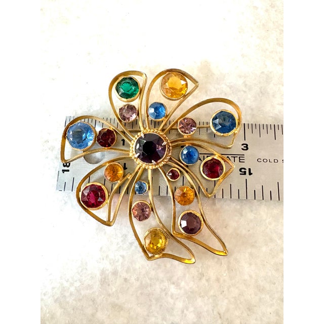 Stunning vintage gold fill rhinestone brooch.