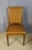 Set of six beechwood chairs upholstered in havana leather with piping. These chairs are from the 20th century and are in...