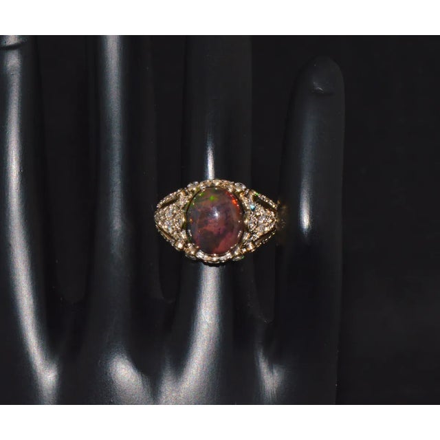 Top quality natural opal and diamond ring. This ring features a gorgeous Bombay dome design set with a huge 2.02CTS...