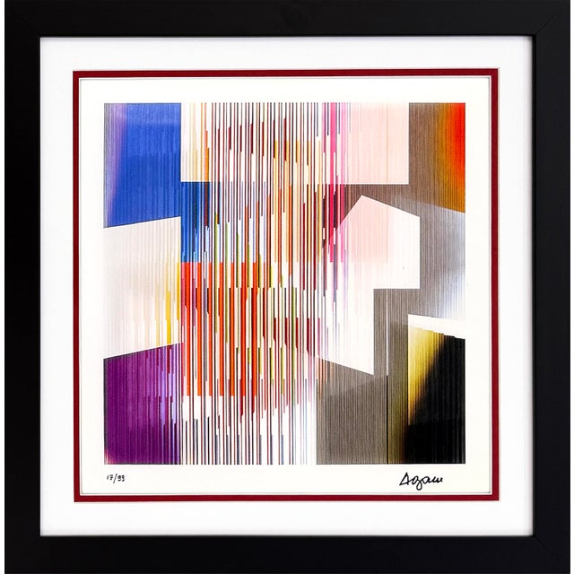 Agamograph (3D lenticular). Hand signed lower right by Yaacov Agam. Hand numbered 17/99 lower left. Artwork size 14.25 x...