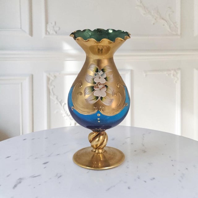 Attributed to a Venetian workshop, this hand-blown Italian art glass cabinet vase dates to the mid-20th century, circa...