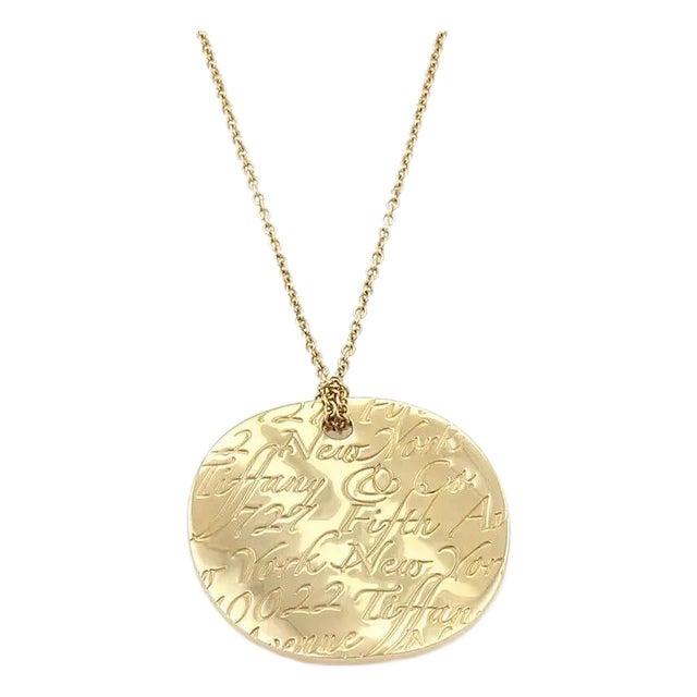Tiffany & Co. Notes 18k Yellow Gold Round Wave Pendant For Sale
