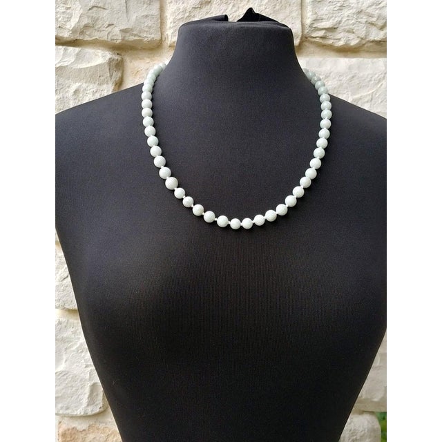 A very gentle and elegant pale celadon jade necklace from the Art Deco period, circa 1920. The necklace measures 24.5...
