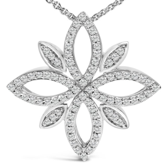 Exude timeless elegance with this enchanting pendant, masterfully crafted from .925 sterling silver. Intricately adorned...