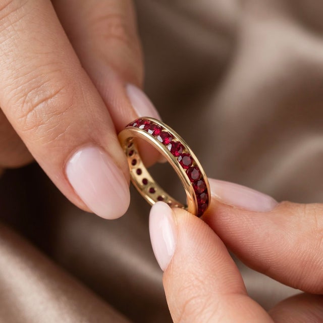 Embrace timeless sophistication with this exquisite full eternity band, meticulously crafted to showcase a continuous...