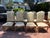 A distinguished set of twelve authentic William Switzer dining chairs, including ten side chairs and two coordinating host...