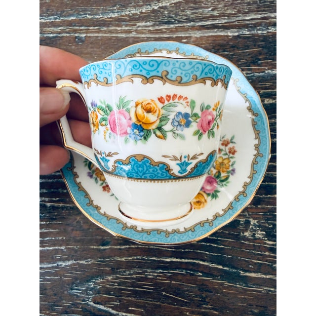 A beautiful set of vintage Crown Staffordshire fine bone china in the Lyric Tunis Blue pattern, made in England. This...