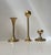 A trio of solid brass candlesticks manufactured in Scandinavia during the 1960s and 1970s. The candlesticks are to be...