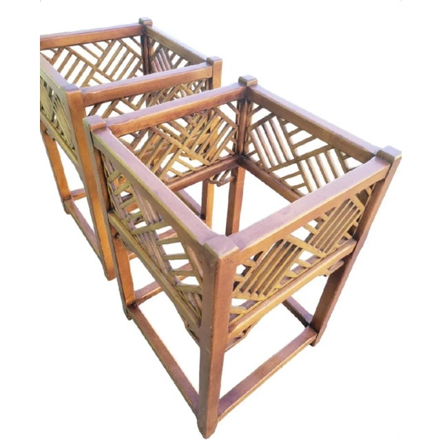 A pair of one of a kind Chinese Chippendale planters by Thomasville. The planters are one of a kind because they were...