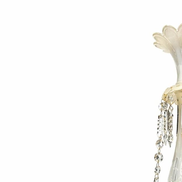 Lighting - Ceiling lamp (110 cm). 20th century Europe; yellow metal structure; column; crystal bobeches and pendants....
