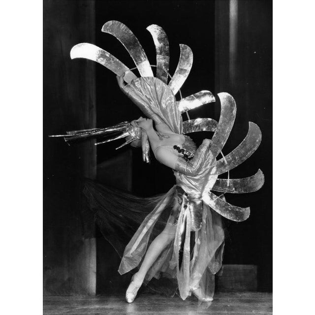 Lethal Losch 6th April 1929: Tilly Losch (1904 - 1974) dancing in an extravagant costume, in a scene from the show `Wake...