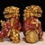This is a striking pair of vintage cloisonné enamel guardian lions, crafted in the traditional style of Beijing lions...