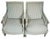A pair of early 20th century bergeres in the style of Louis XVI. These chairs are high quality shop made examples of the...